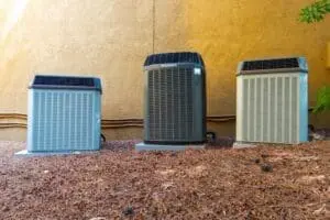 FAQs - Ambient Edge three air conditioner compressors outdoors next to building