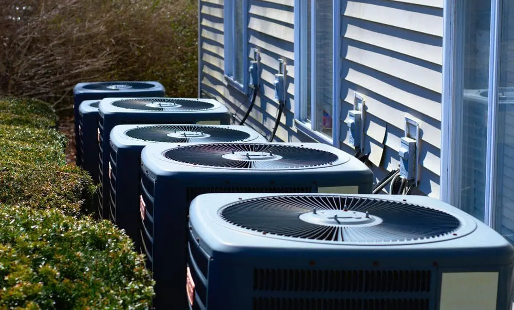 air conditioning units outside apartment complex