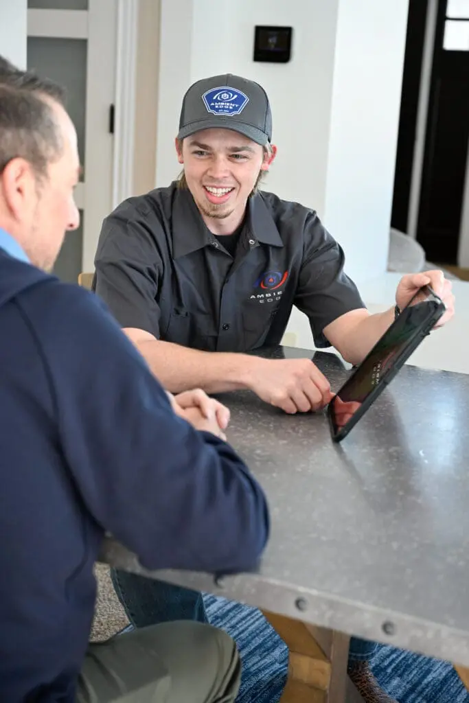 Ambien Edge plumber consulting with a customer