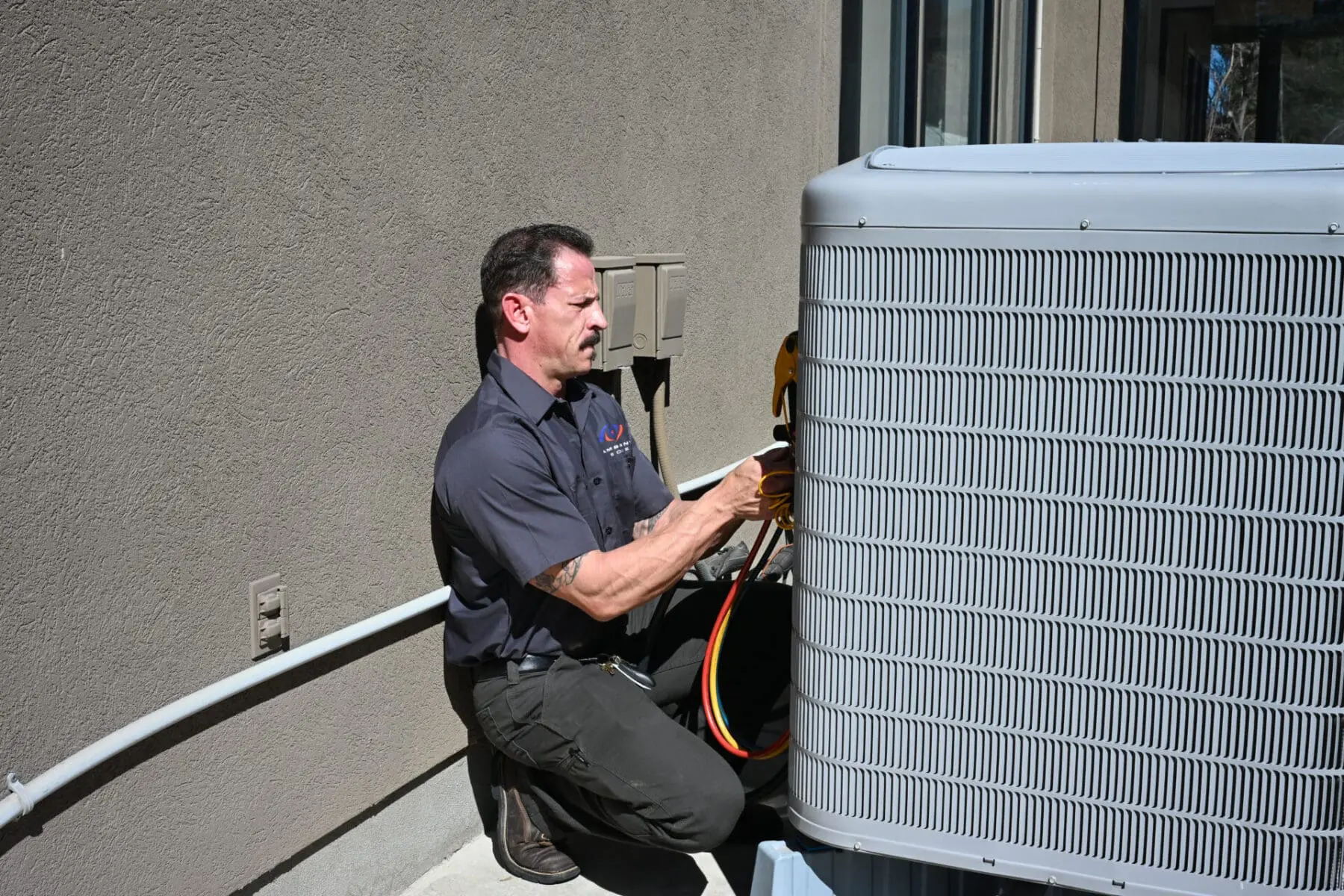 ambient edge employee checking ac unit