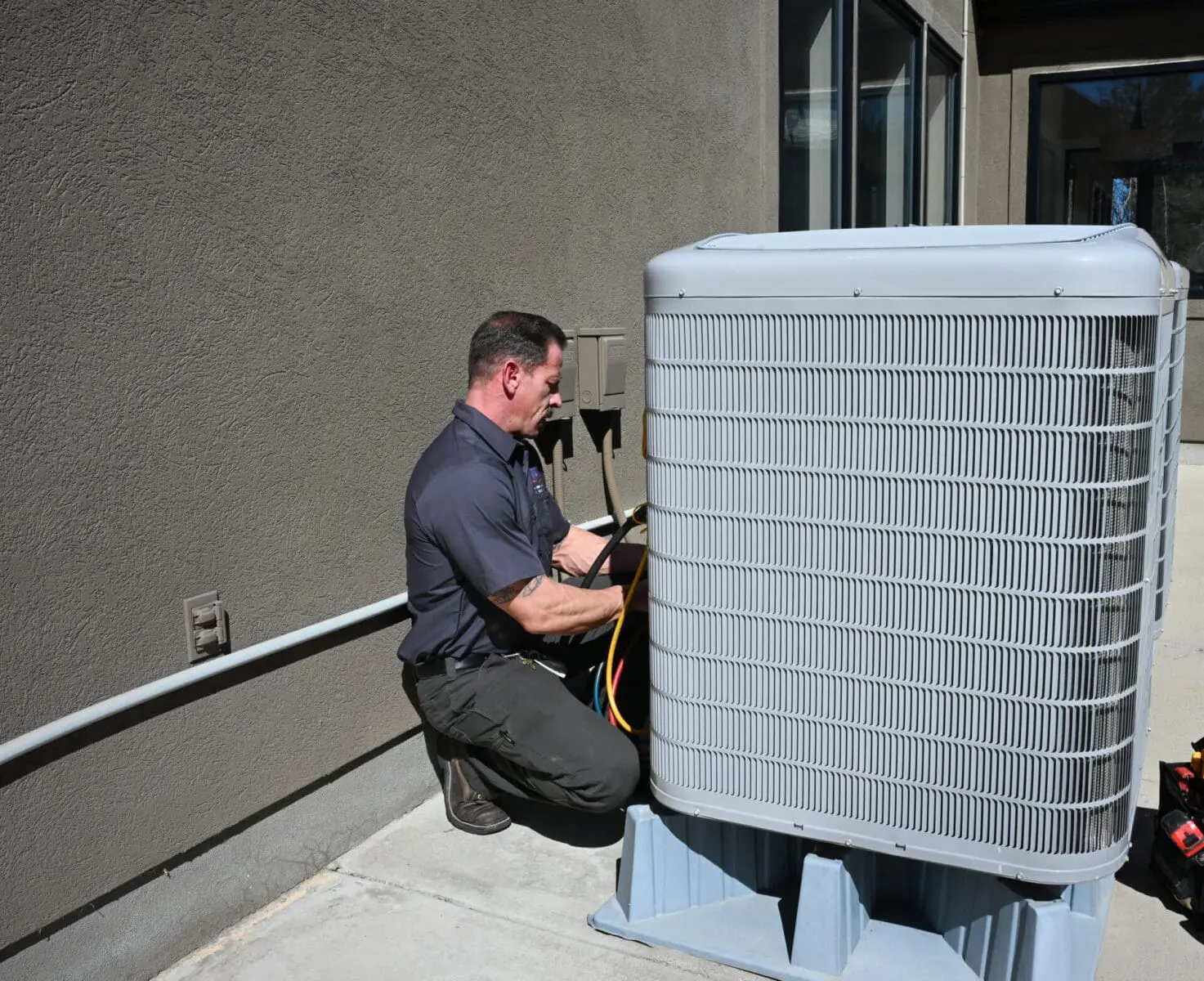ambient edge employee checking ac unit