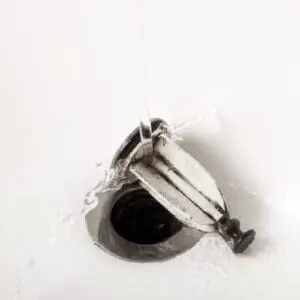 water faucet pouring into a sink