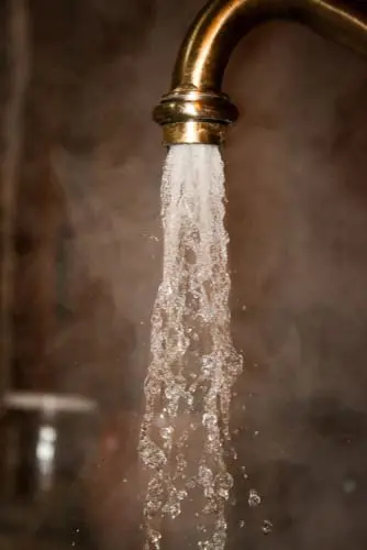 water pouring from a faucet