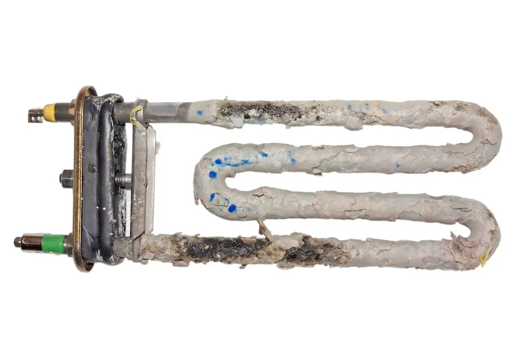 Corrosion heating elements of water heater with scum and sediment isolated on white background