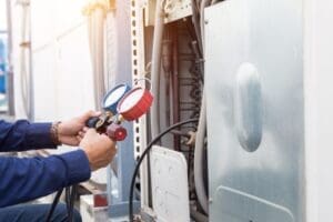 technician performing inspection on hvac system