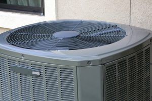 air conditioner’s condenser unit outside residence