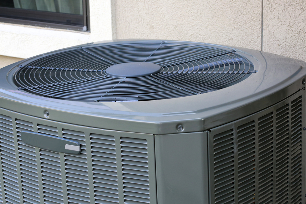 air conditioners condenser unit outside residence
