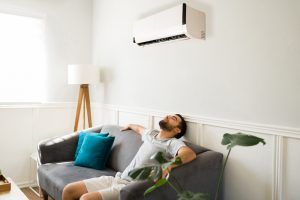 man enjoys his newly installed AC unit