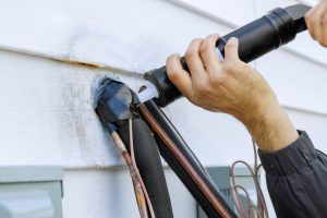 Re-caulking HVAC pipes after a repair is an important part of residential HVAC repair. If your Summerlin home has an HVAC problem, call us.
