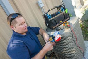 air-conditioner-repair-man-using-testing-equipment