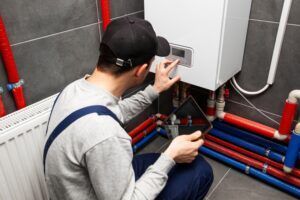 technician checking heating system