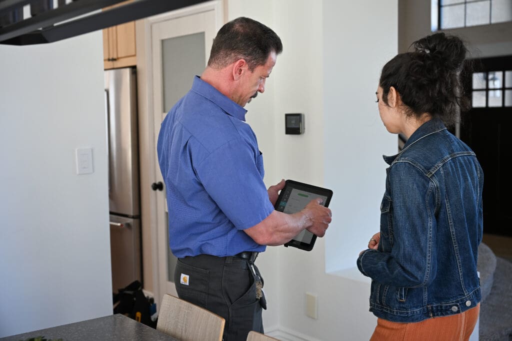 ambient edge employee talking to a customer
