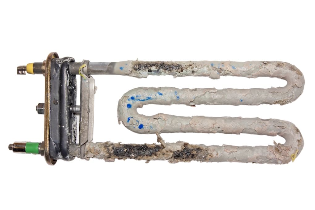 Why Is My Hot Water Dirty? - Ambient Edge Corrosion heating elements of water heater with scum and sediment isolated on white background