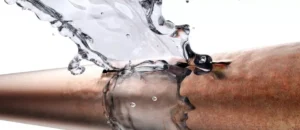 water splashing onto a pipe